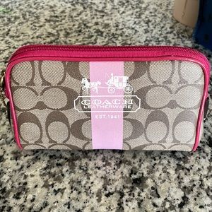 Coach makeup bag. Looks brand new!